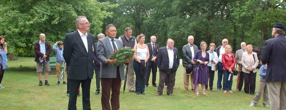 Under the Queen's Colours launch guests at the military cemetery, Royal Victoria Country Park, Netley, 3 June 2012.
